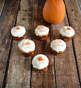 Delicious spiced Pumpkin BUtterscotch Muffins with Caramel Forssting and sprinkles!