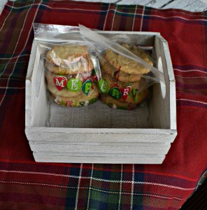 Package cookies in holiday plastic baggies to deliver to friends