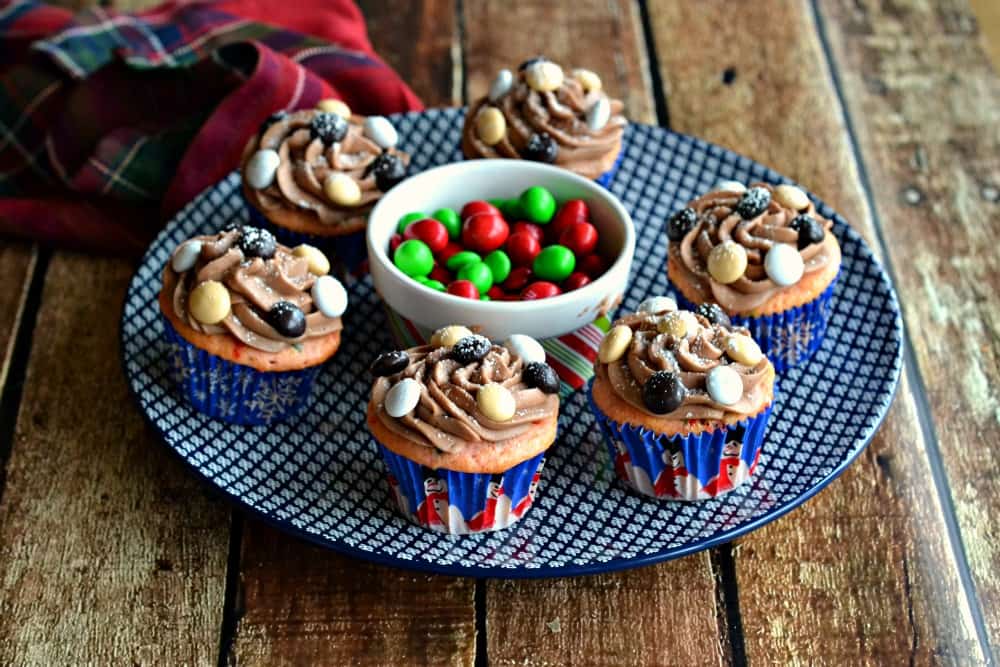 Host the perfect holiday party with these White Chocolate Peppermint Cupcakes with Hot Chocolate Frosting