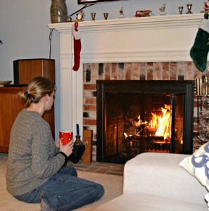 Enjoying a cup of Bigelow Tea Constant Comment in front of the fire