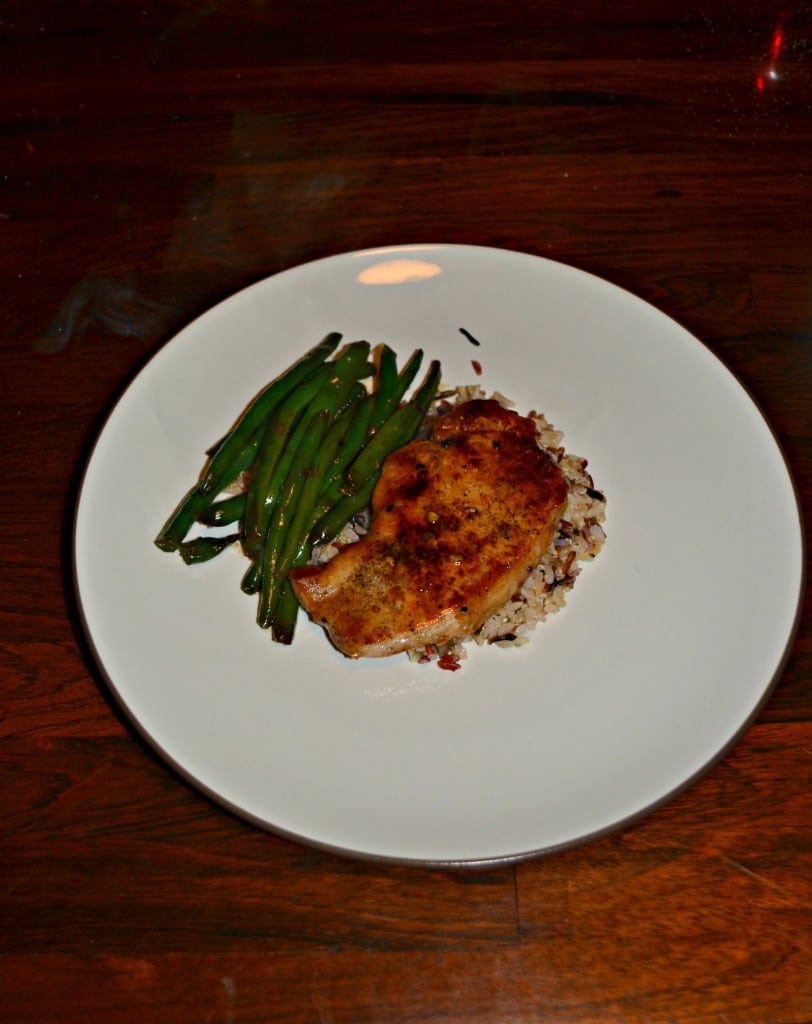 Take a bite of this juicy and delicious Honey and Soy Glazed Pork Chop with Green beans!