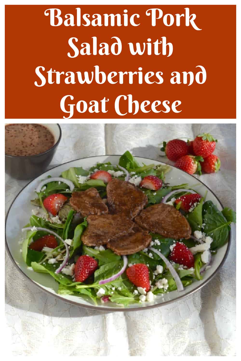 Pin Image:  Text title, a plate of salad with pork and strawberries on top. 