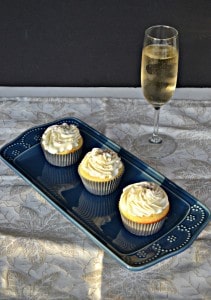 Delicious Vanilla Cupcakes topped with fluffy Champagne Frosting are perfect for New Year's Eve!
