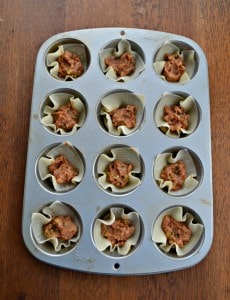 Need an easy Game Day snack? Check out these fun Chili Cheese Bean Dip Cups!