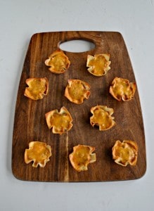 Bake up these delicious Chili Cheese Bean Dip Cups in crispy wonton wrappers!