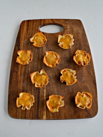 Bake up these delicious Chili Cheese Bean Dip Cups in crispy wonton wrappers!