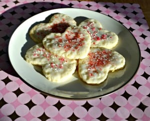 Love these lemon flavored Heart Shaped Cookies with sprinkles!