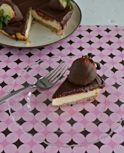 Grab a slice of this simple Chocolate Covered Strawberry Cheesecake before it's gone!