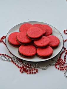 Delicious red Sandwich Cookies filled with Chocolate
