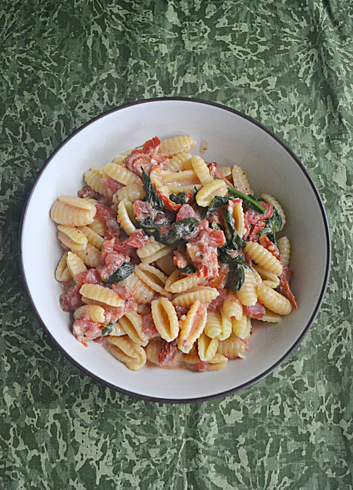 A bowl of pasta.