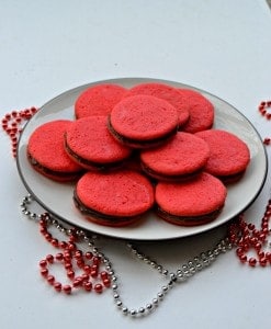 Enjoy these fun Red Sandwich Cookies filled with Chocolate for the holidays!