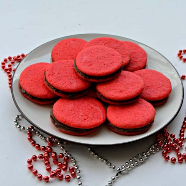 Enjoy these fun Red Sandwich Cookies filled with Chocolate for the holidays!