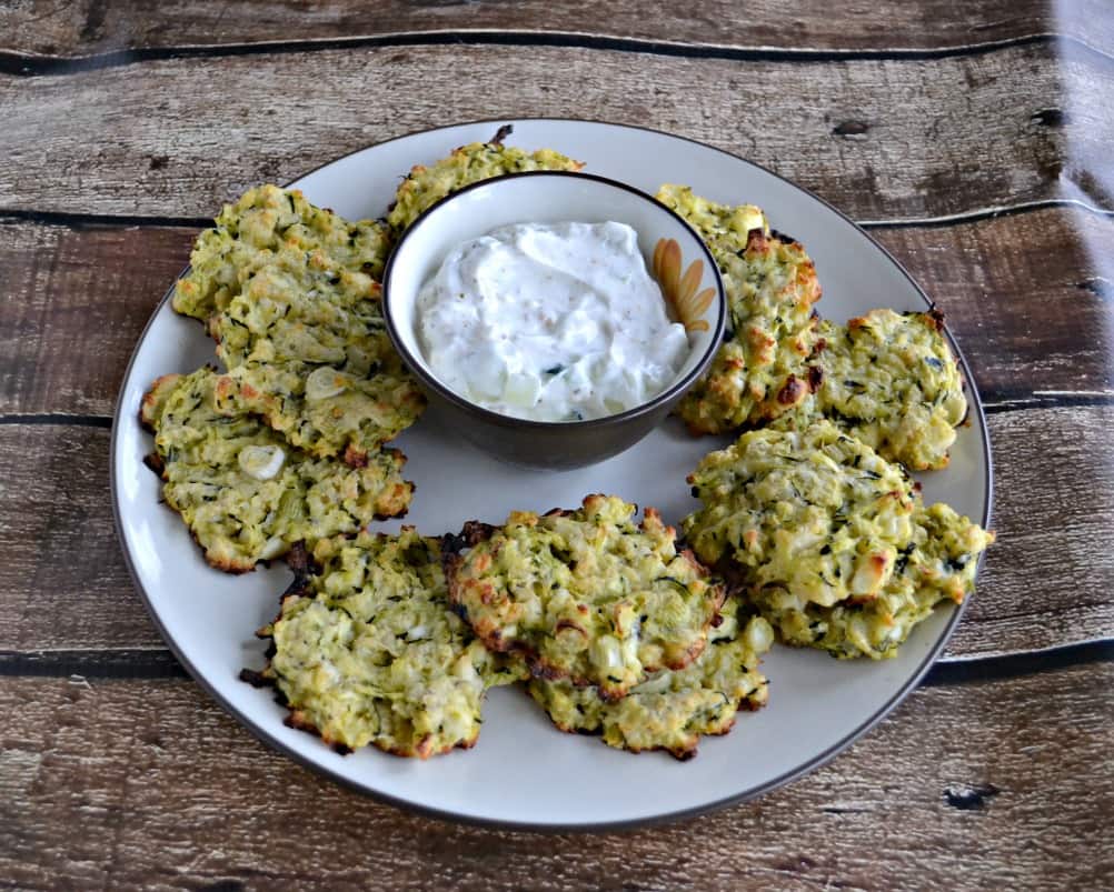 Tired of the same old side dish? Make these Baked Greek Zucchini Fritters for something new!