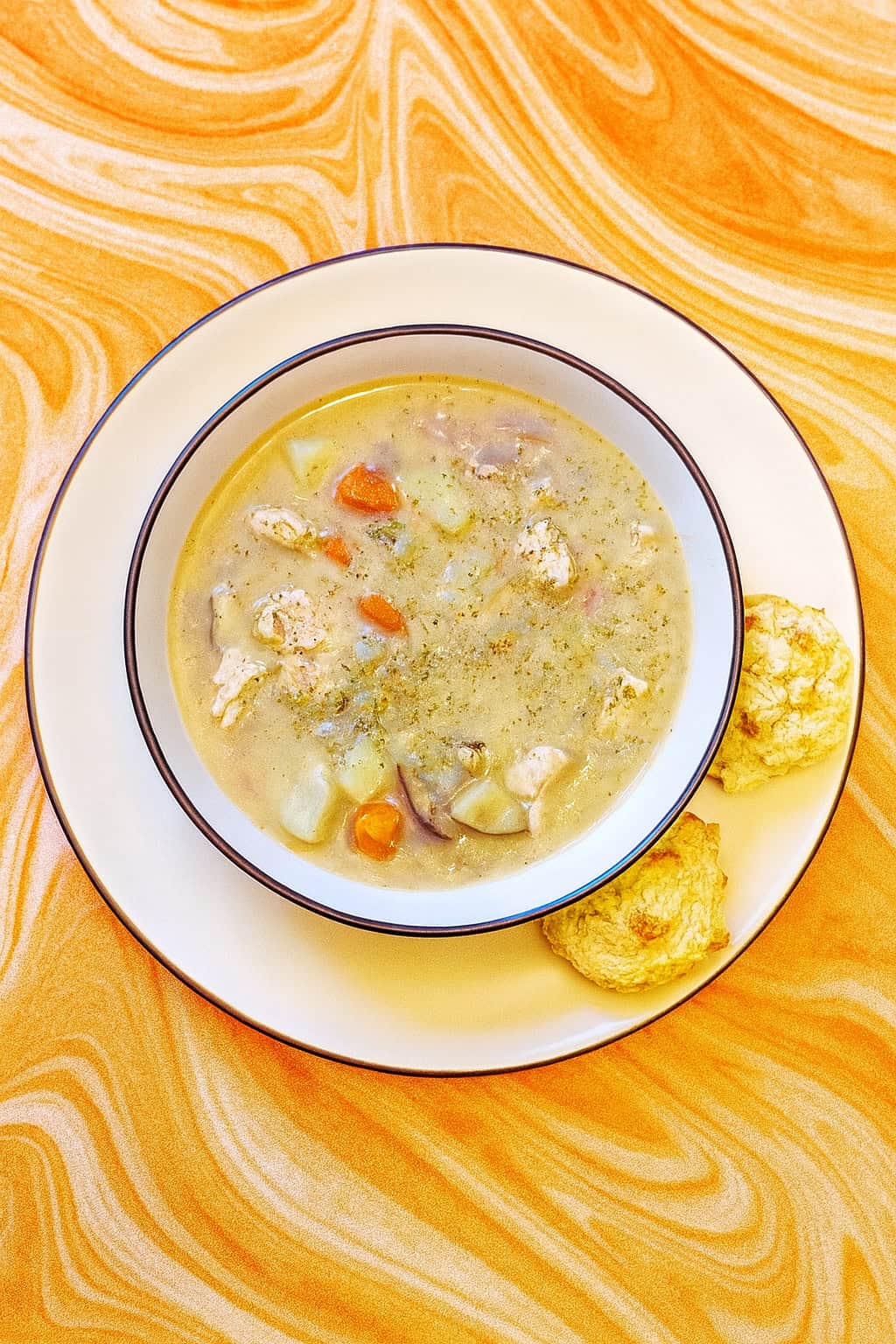 A bowl of turkey and vegetable stew.