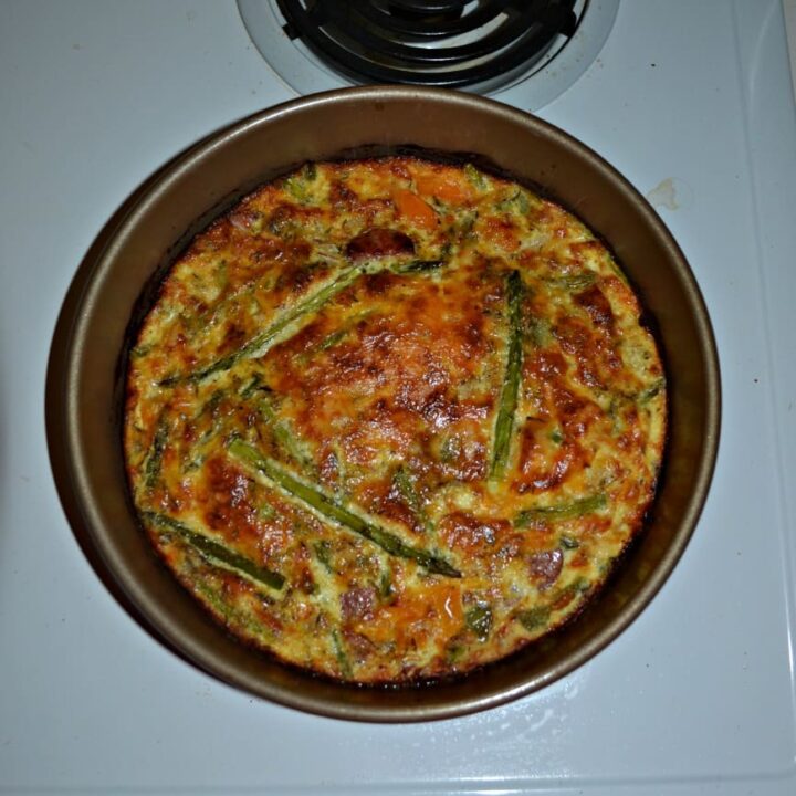 Make an easy and delicious dinner with this Crustless Quiche with Asparagus, Kielbasa, and Peppers