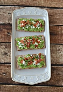 It only takes a few minutes to make these delicious Spring Pea and Green Onion Crostini bites!