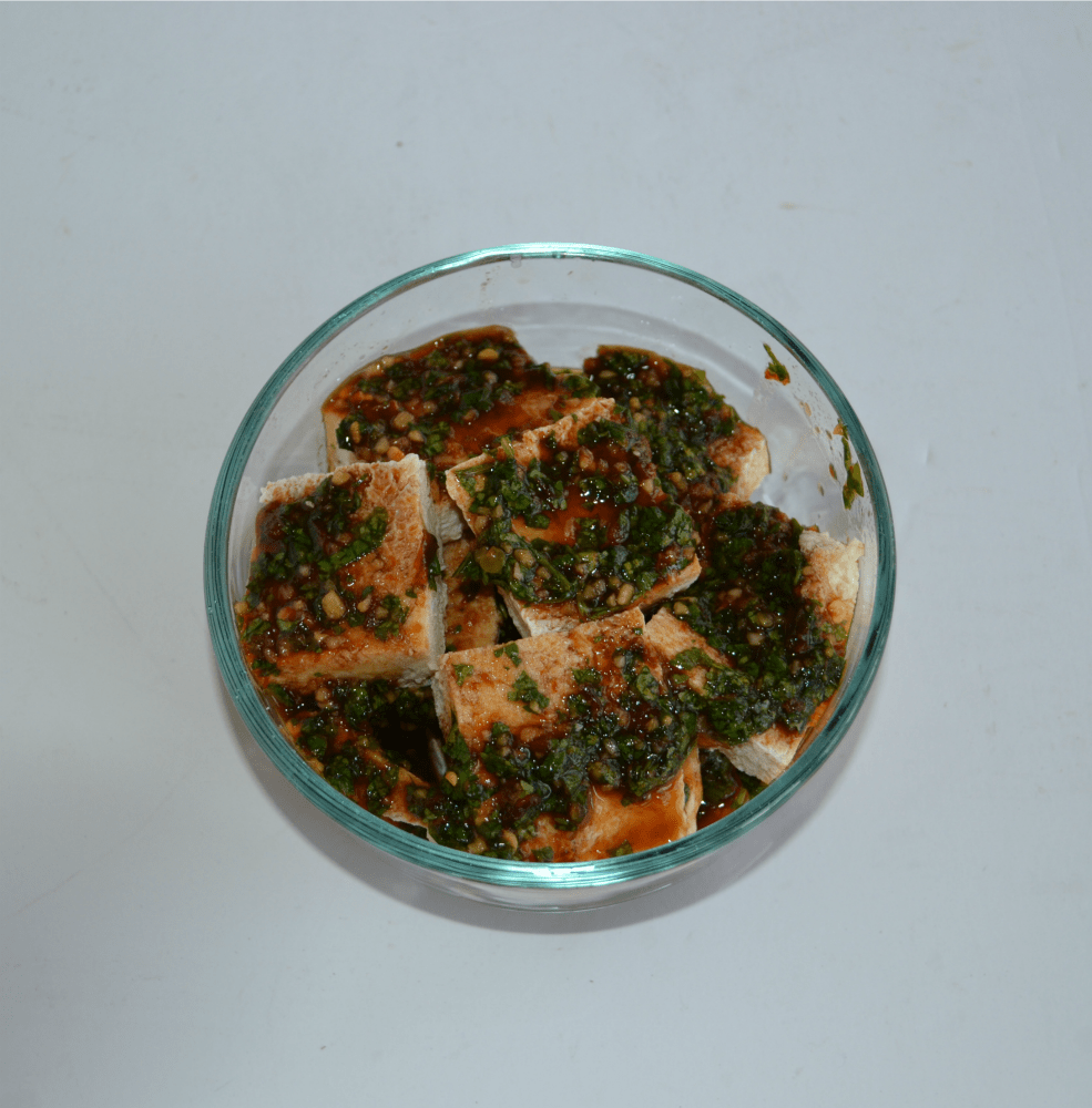 Yum Yum Tofu marinading in a delicious sauce