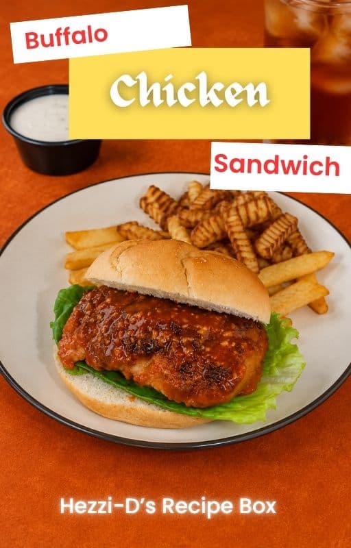Pin Image: Title, A plate with a buffalo chicken sandwich and french fries with a cup of blue cheese behind the plate.