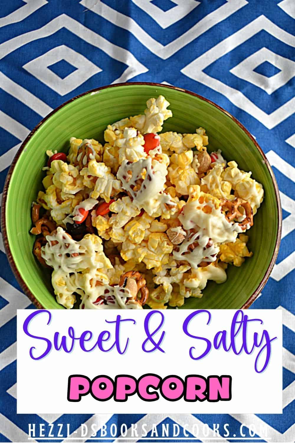 PIN IMAGE: A bowl of popcorn with M&M's, peanuts, and white chocolate drizzle, title.