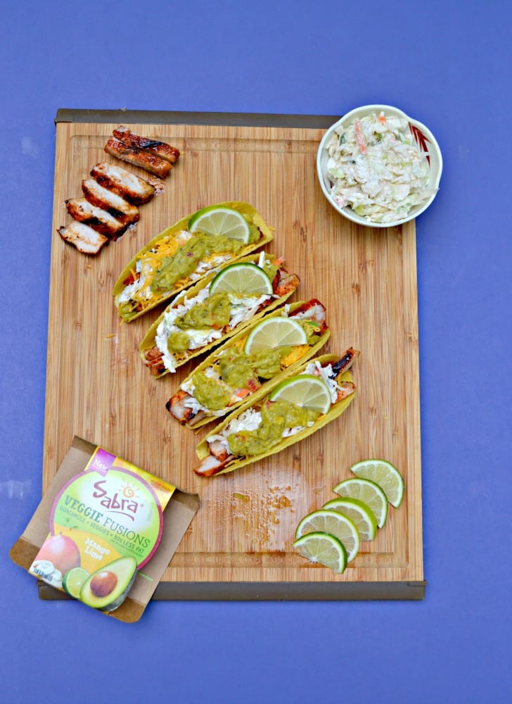 It's summertime so grill up some BBQ Pork Tacos with Slaw and Guacamole