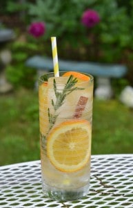 Sip on a refreshing Citrus Rosemary Spice Infused Sparkling Water using rosemary, cinnamon, and oranges in DASANI® Sparkling lime water