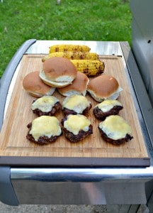 Grill these tasty burgers brushed with homemade Bourbon BBQ Sauce then topped with bacon, cheese, and lettuce