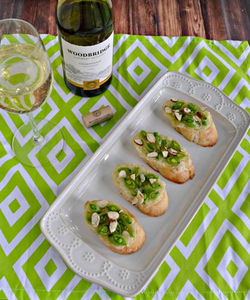 Crostini with Brie, Fresh Peas, and Honey paired with Woodbridge by Robert Mondavi Chardonnay is a summertime favorite!