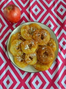Try these easy to make Fried Apple Fritters topped with powdered sugar!