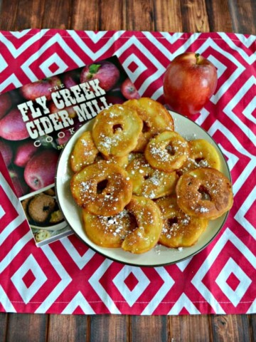 I love these crispy Apple Fritters topped with Powdered Sugar from the Fly Creek Cider Mill Cookbook!