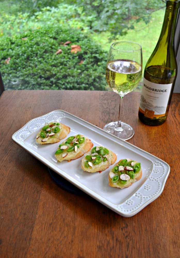 Crostini with Brie, Fresh Peas, and Honey