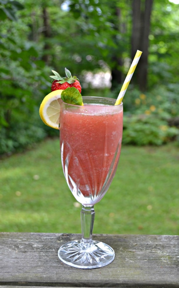 Cool off this summer with a tasty Frozen Strawberry Lemonade Moscato Punch