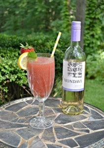 Grab a straw and take a big sip of this Frozen Strawberry Lemonade Moscato Punch!