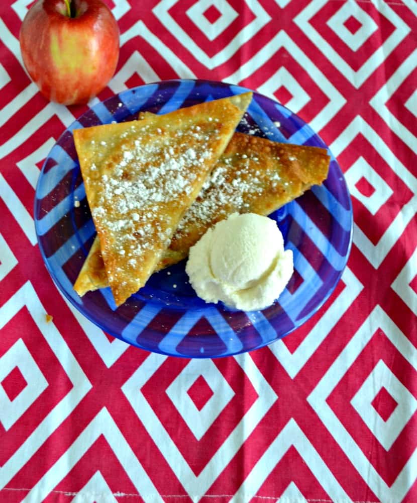 Looking for an awesome apple dessert? Try these Wonton Apple Pockets sprinkled with powdered sugar and served with ice cream.