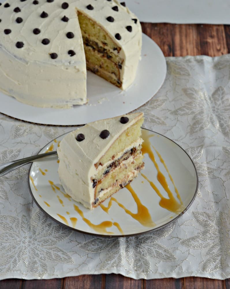 Cut out a piece of this Dream Cake before you share it! With layers of Coconut Chocolate Chip Cake soaked in Sweet Cream Syrup and topped with Salted Caramel Frosting it'll go fast!