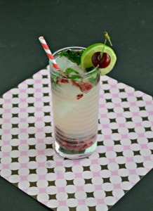 I love to sip on these Cherry, Berry Mojitos with mint!