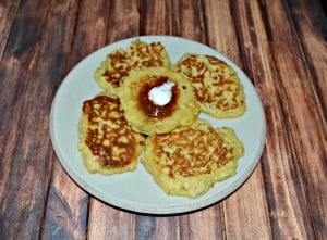 WIth corn in season these Fresh Corn Cakes topped with salsa and sour cream are a favorite late summer side dish!