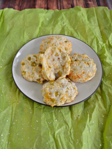 Grab a pat of butter and enjoy one of these fluffy Green Chile and Cheddar Biscuits