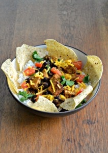 Serve this delicious Tofu Sofritas Bowl with a side of tortilla chips