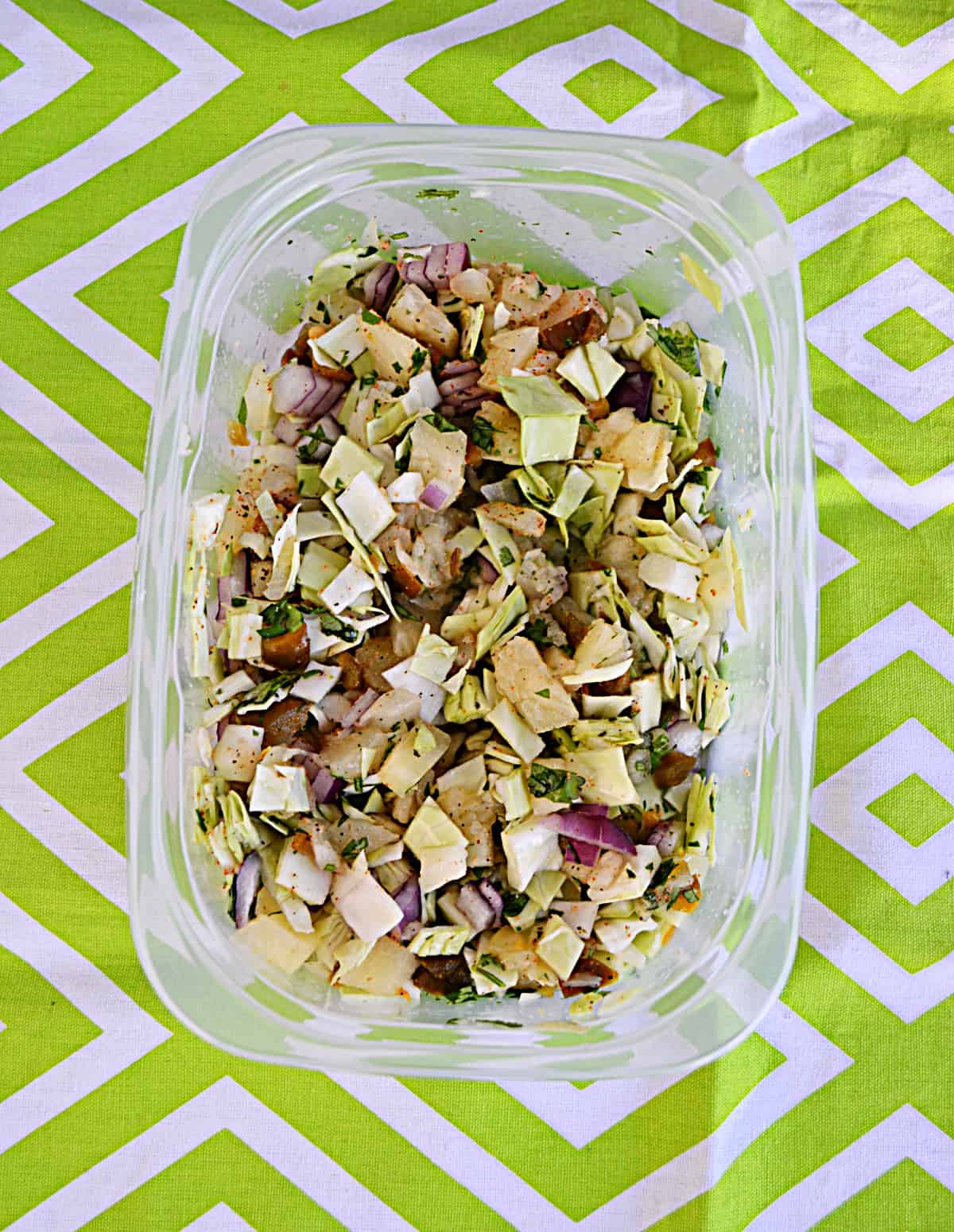 A container of jalapeno pineapple slaw.