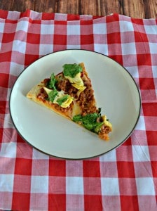 Grab a slice of this spicy Spinach, Chorizo, and Artichoke Pizza!