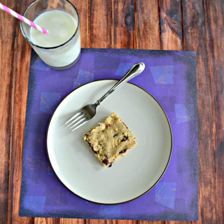 Grab a fork and a glass of milk to go with these awesome Gluten Free Chocolate Chip Cookie Bars made with coconut oil!
