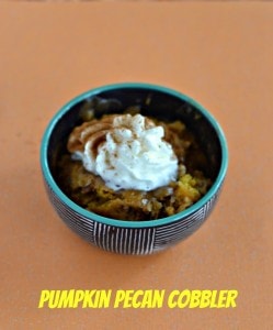 Looking for a great fall dessert? You can't beat this warm Pumpkin Pecan Cobbler topped with whipped cream!