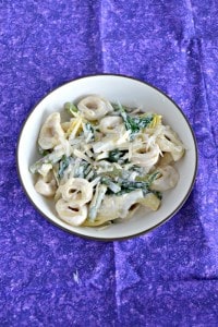 Families will love this easy Spinach Artichoke Tortellini with Creamy Lemon Sauce