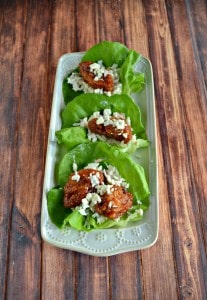 These Boneless BBQ Chicken Wing Lettuce Wraps with coleslaw and blue cheese is a tasty Game Day snack.