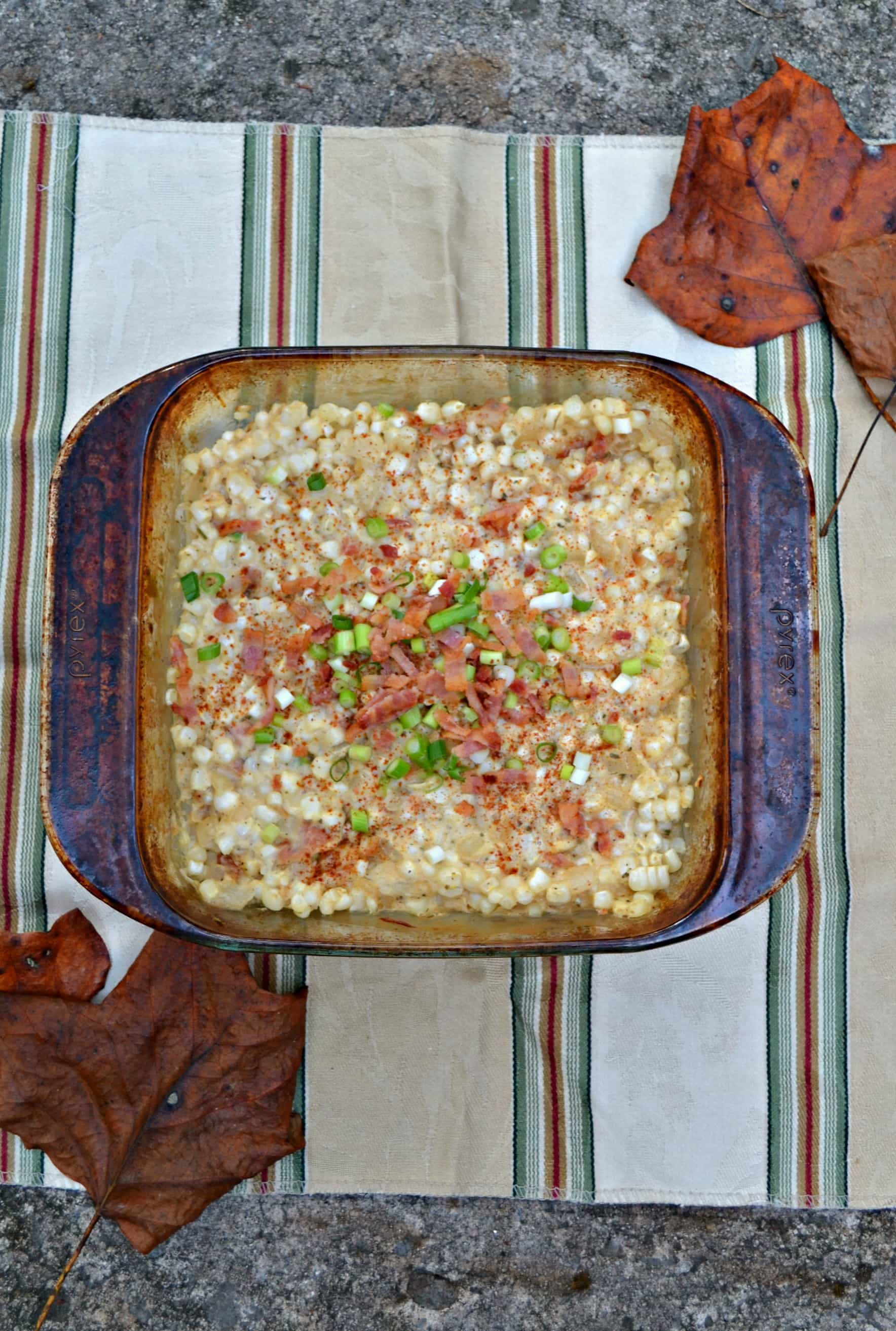 Creamy Corn Casserole is made with fresh corn, bacon, and onions!