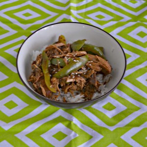Love this tasty Sweet and Spicy Slow Cooker Asian Chicken with Peppers and Peas