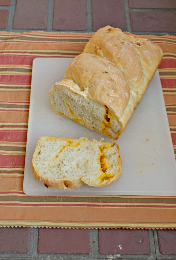Looking for a hearty bread to go with your soup? You'll love this flavorful Caramelized Onion Cheddar Cheese Bread!