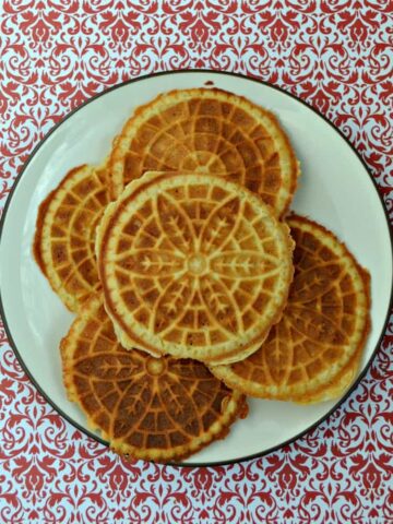 Looking for an easy to make Christmas cookie? Try these Spiced Vanilla Pizzelle cookies made in a Pizzelle maker!