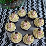 These tasty Gingerbread Cupcakes with Eggnog Frosting and mini snowmen are a delicious dessert all winter long!