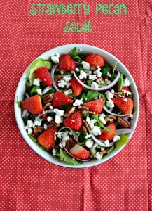 Need a fresh and delicious holiday side dish? Try this tasty Strawberry Pecan Salad with goat cheese, fresh Florida Strawberries, and a Honey Balsamic Vinaigrette